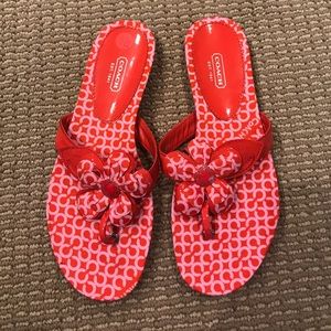 AUTHENTIC PINK AND RED COACH FLOWER FLIP FLOPS